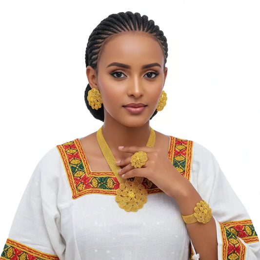 Woman wearing traditional attire with colorful embroidery on a white background