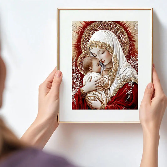 Framed artwork of a religious scene with a woman holding a child against a white background