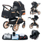 Black and beige baby stroller with accessories on a white background