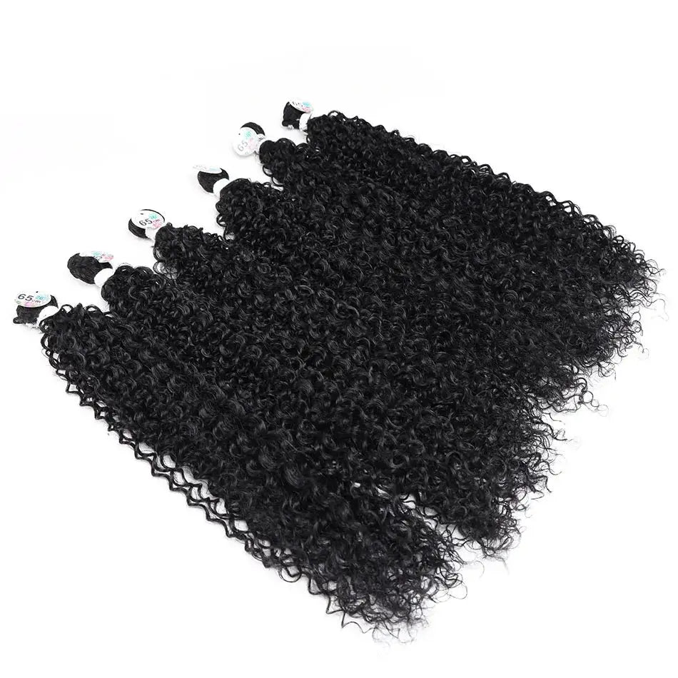 Set of curly hair extensions on a white background