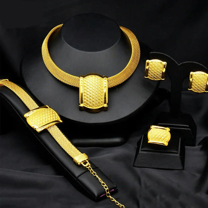 Gold necklace and bracelet set on a black background with 'Royal' branding.