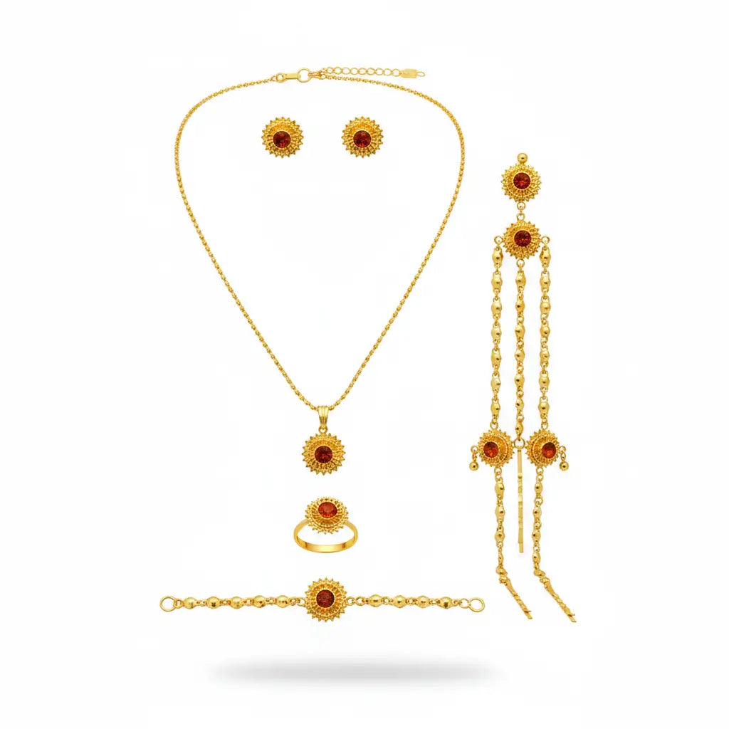 Gold jewelry set with necklace, earrings, ring, and bracelet on a white background