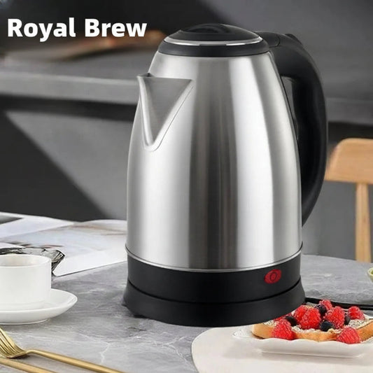 Electric kettle on a table with limes and a dessert, text 'Electric kettle Quick heating'.