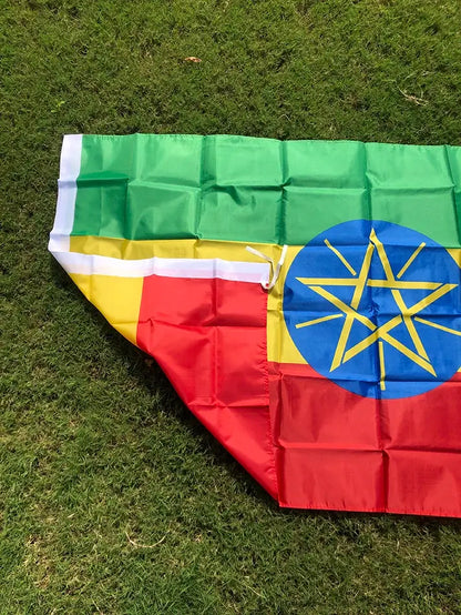 Flag of Ethiopia on a grassy background