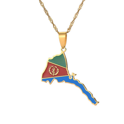 Gold necklace with a pendant shaped like a map, featuring red, green, and blue colors on a white background.